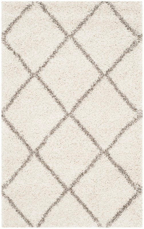 Duhon Ivory/Gray Shag Area Rug - @ARFurnitureMart