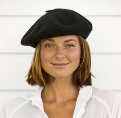women wearing a french beret hat