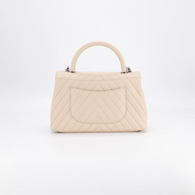 light beige purse