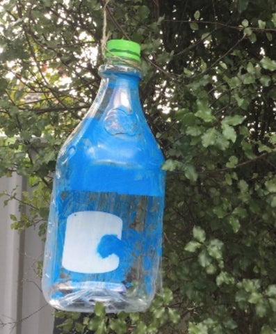 bird feeder from re-used juice bottles