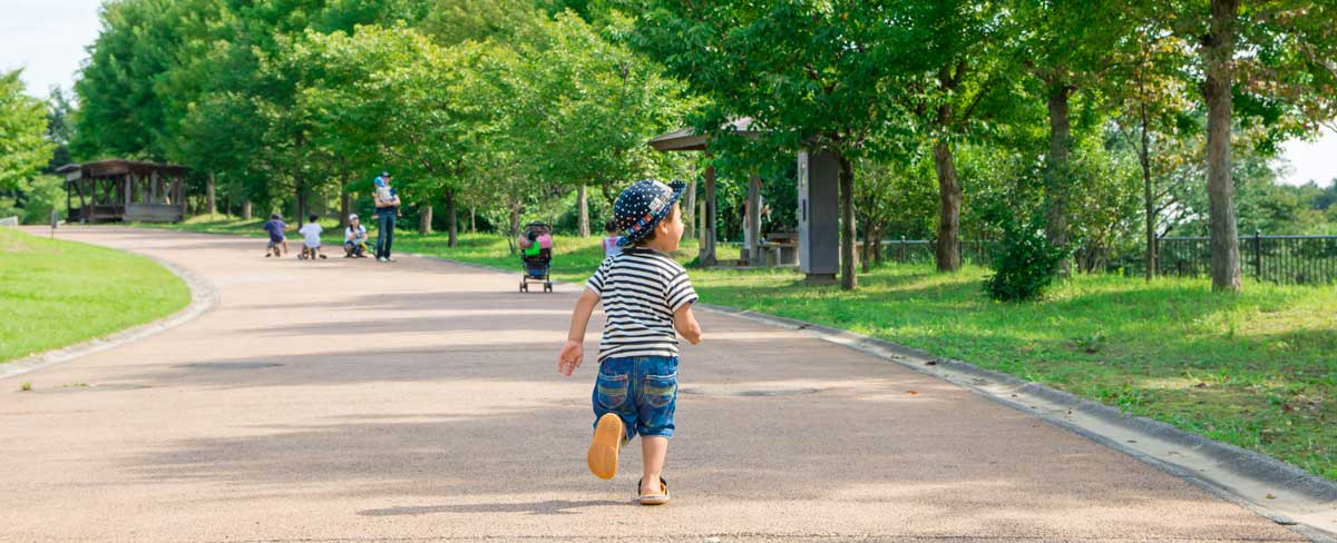 Toddler in park on excursion - Butler Creative Childcare Resources