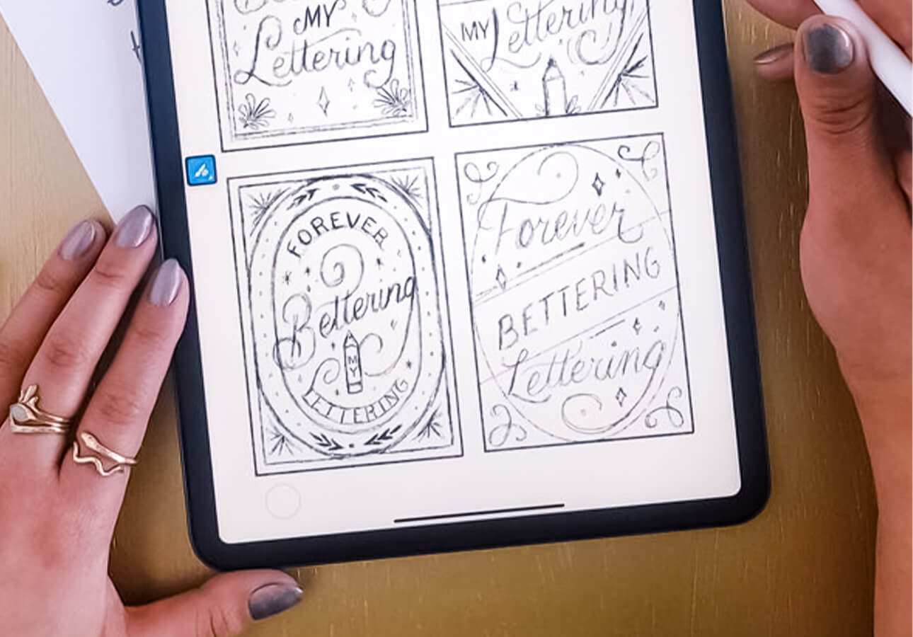 An iPad displaying hand lettering sketches.