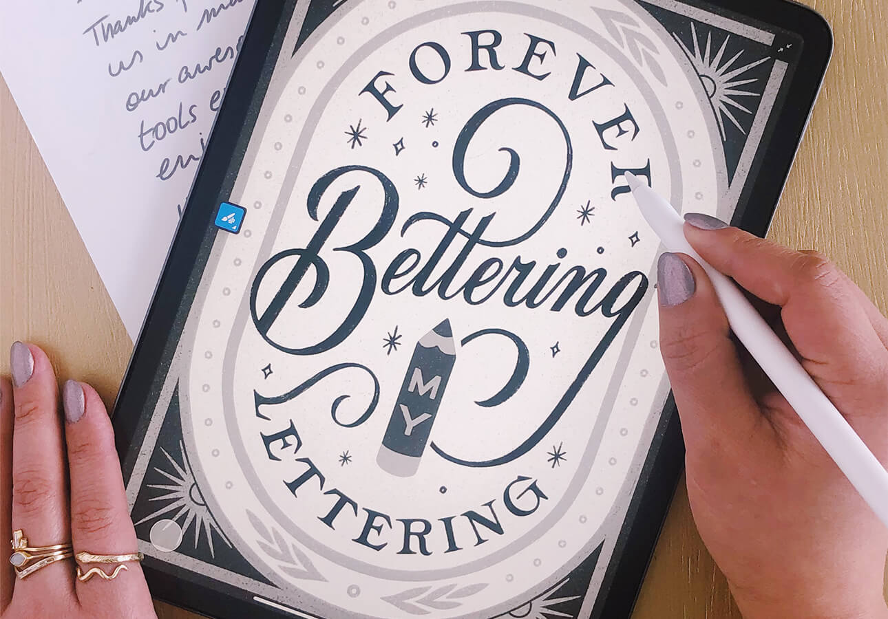 An iPad displaying a vectorized hand lettering piece.