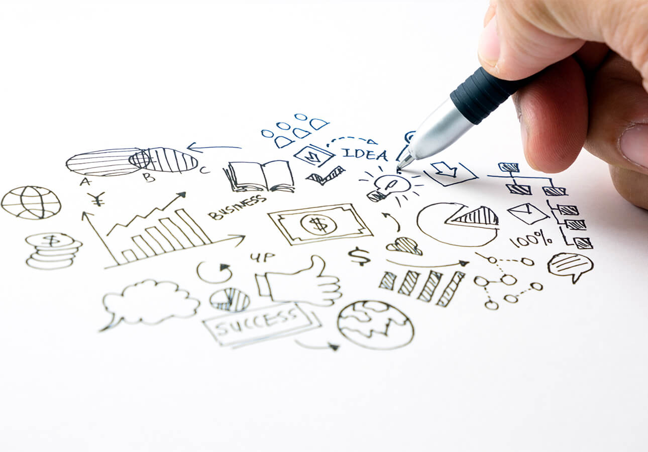 A doodler draws a cluster of business and productivity icons in the shape of a cloud.
