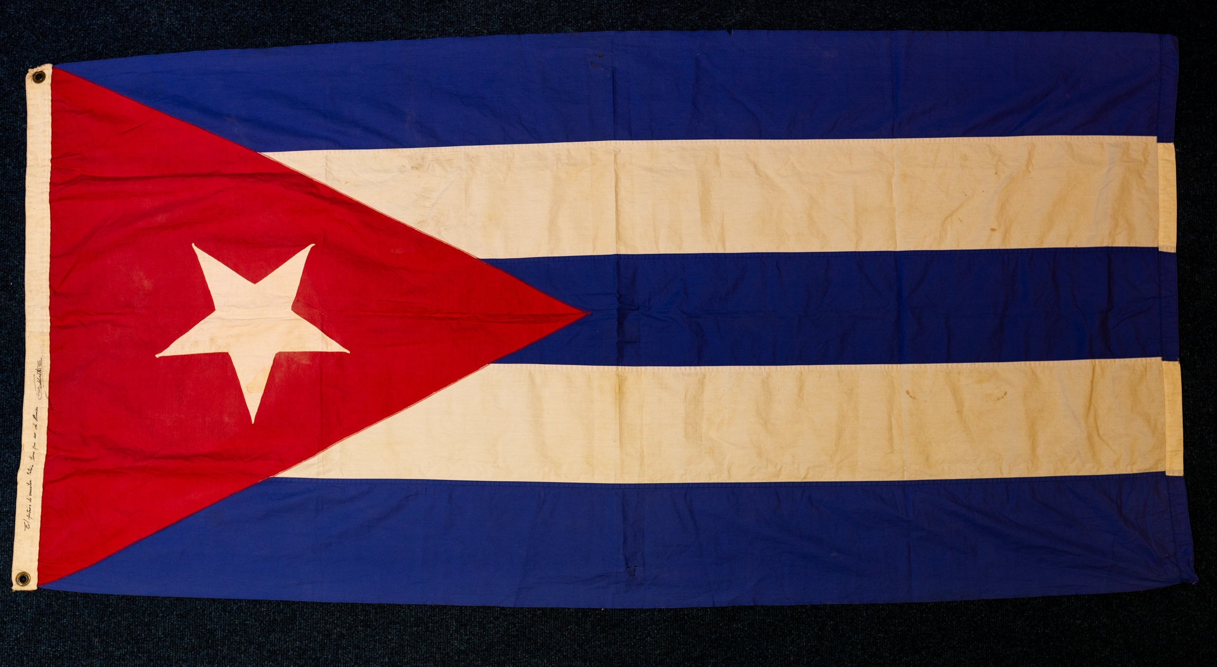 Fidel Castro personally signed flag