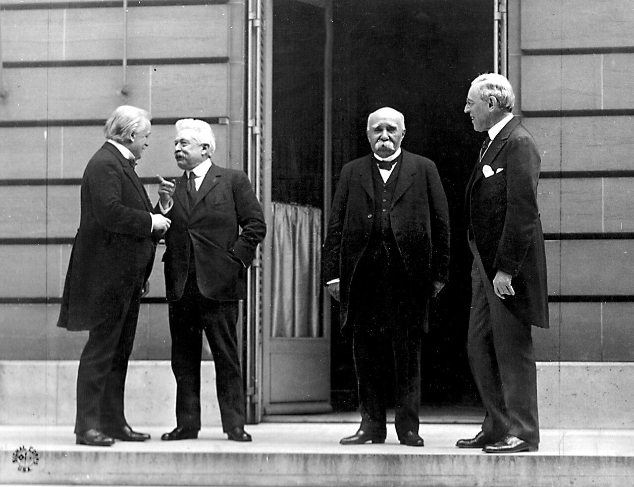 David Lloyd George, Vittorio Orlando, Georges Clemenceau, and Woodrow Wilson at the Treaty of Versailles talks