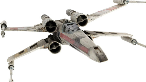 a model of an x wing fighter from the film Star Wars the Final Hope