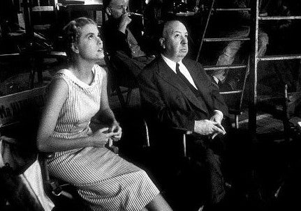 Albert Hitchcock and Grace Kelly on the set of Dial M for Murder.