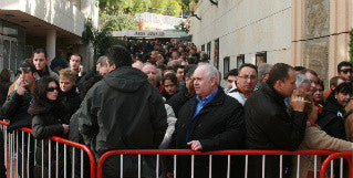 The crowd awaiting the official opening 