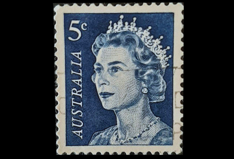 the Queen Elizabeth II 5c blue stamps