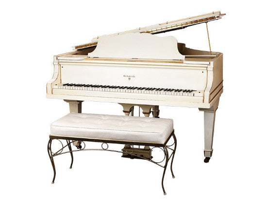 Elvis white piano 