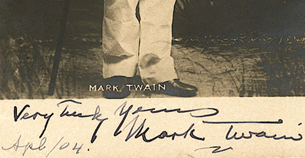 Mark Twain's signature on a photograph