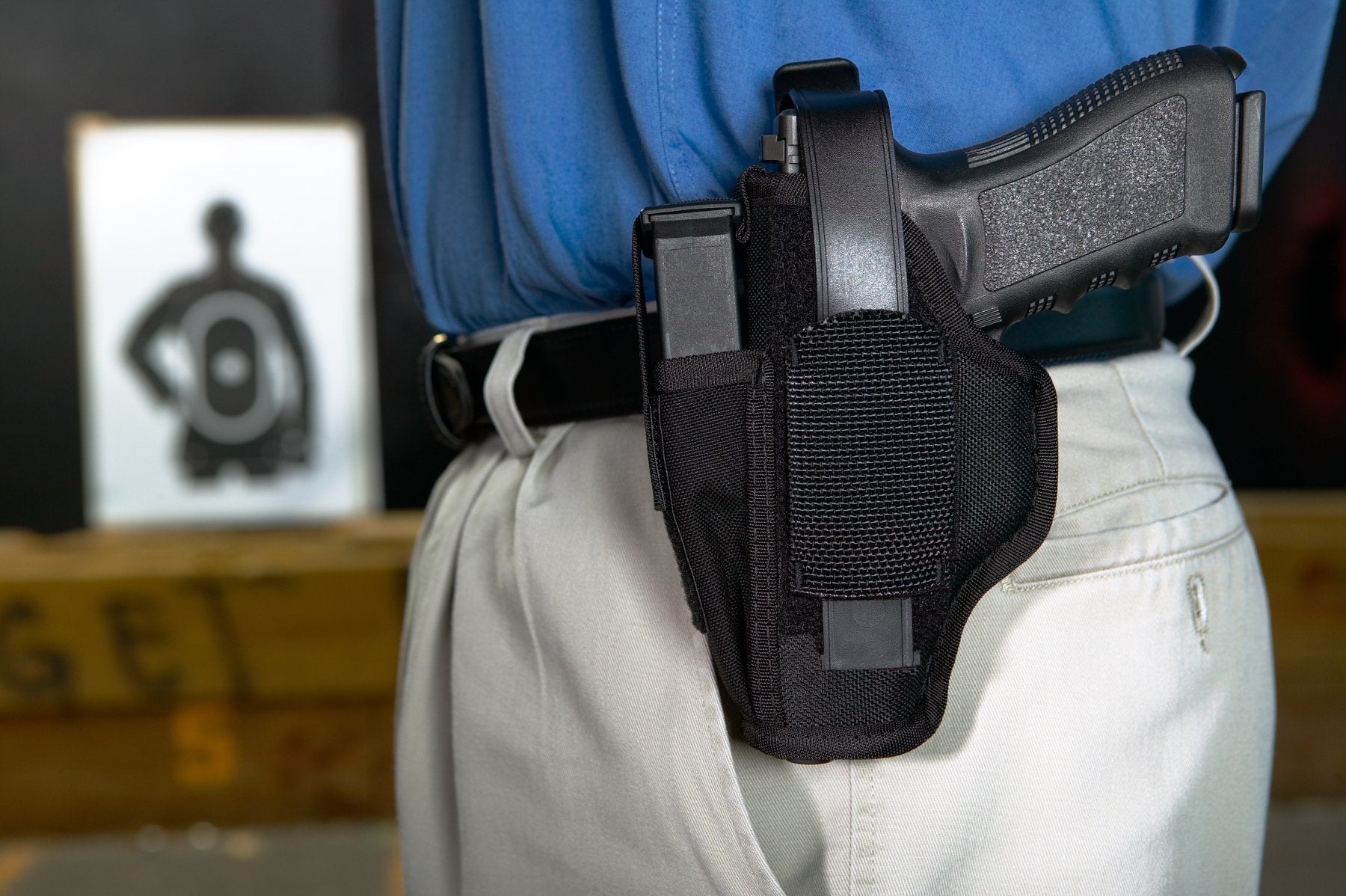 Man wearing a gun holster