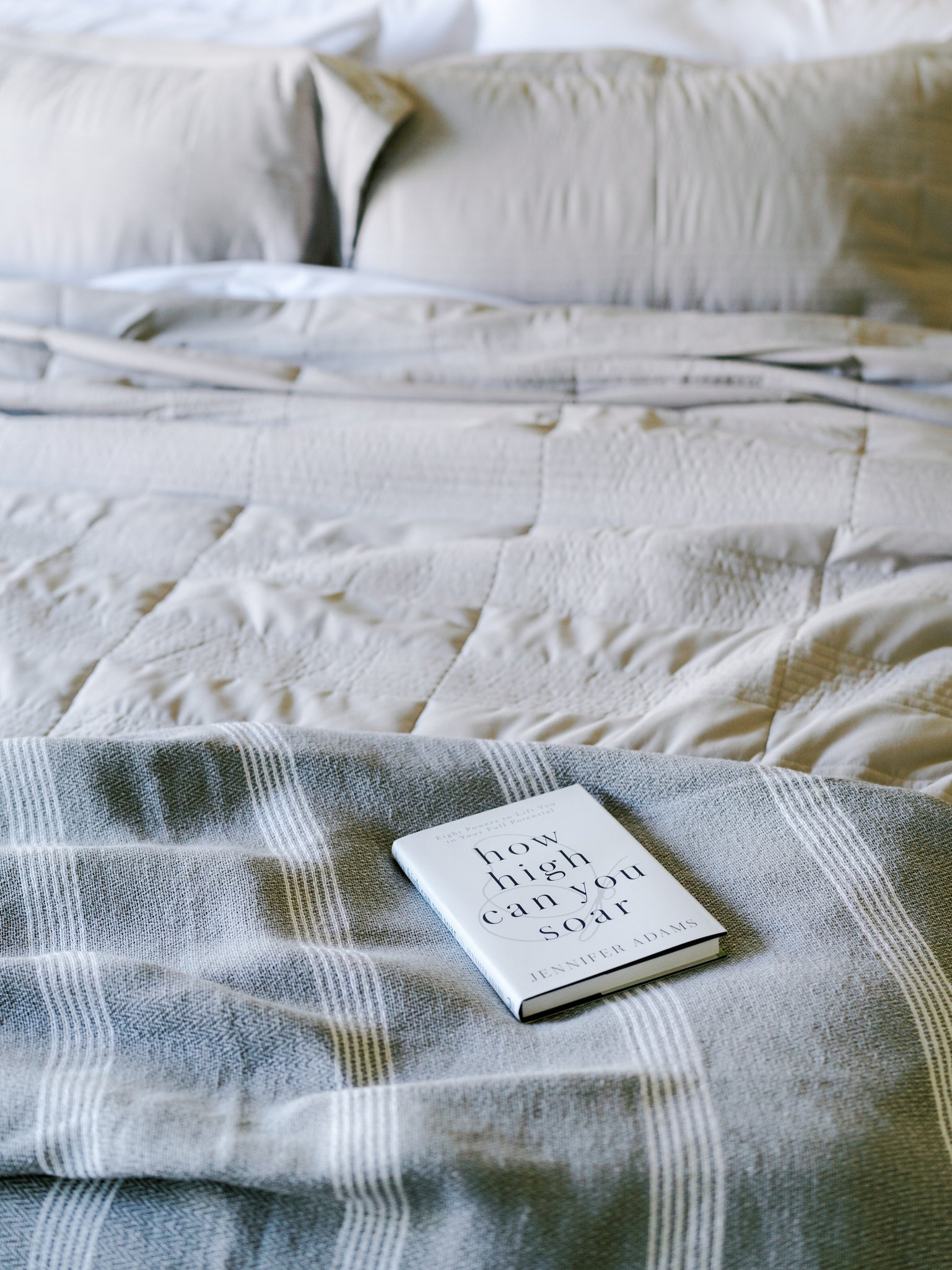 Jennifer Adams blanket on a bed