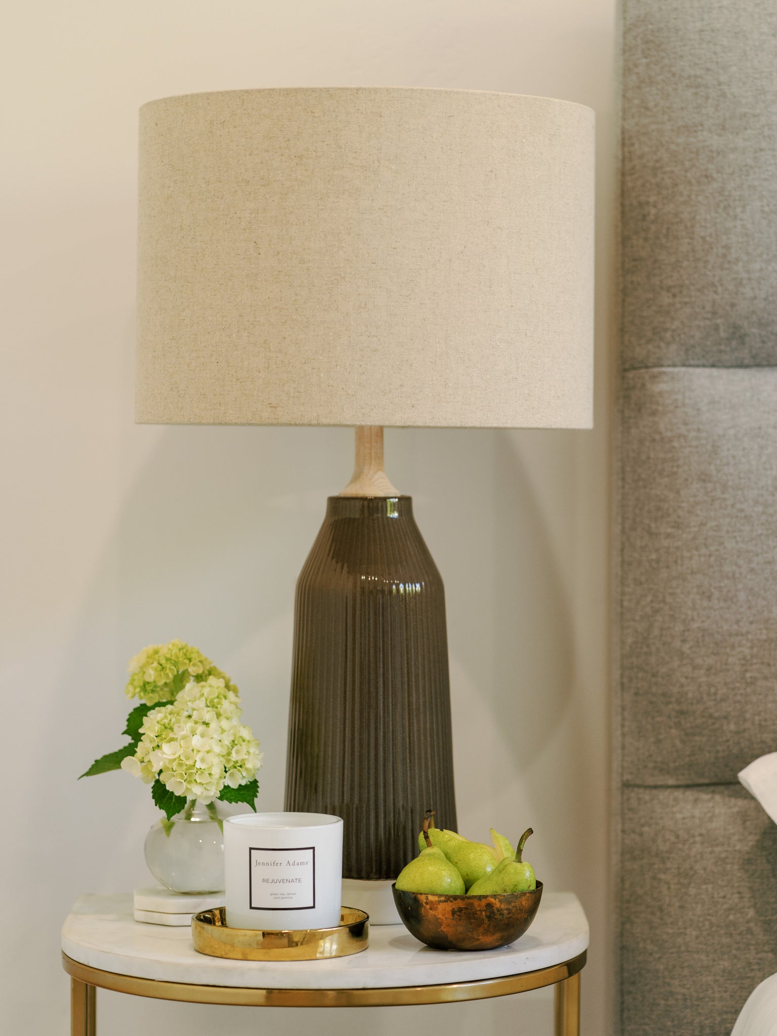 Bedside lamps add a warm glow that adds to the hotel-inspired ambiance