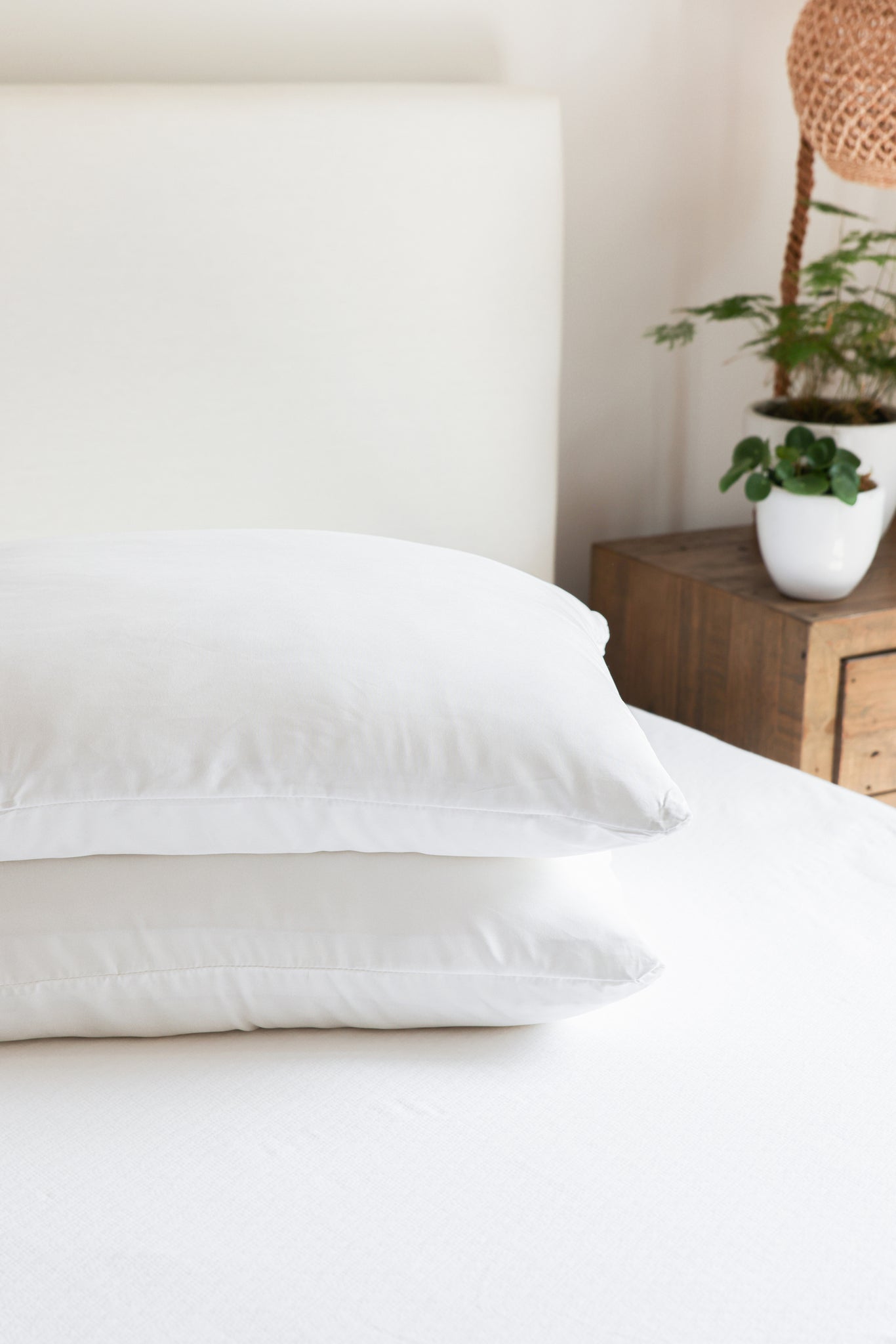 A pristine white pillow protected by the Hypoallergenic Pillow Protector