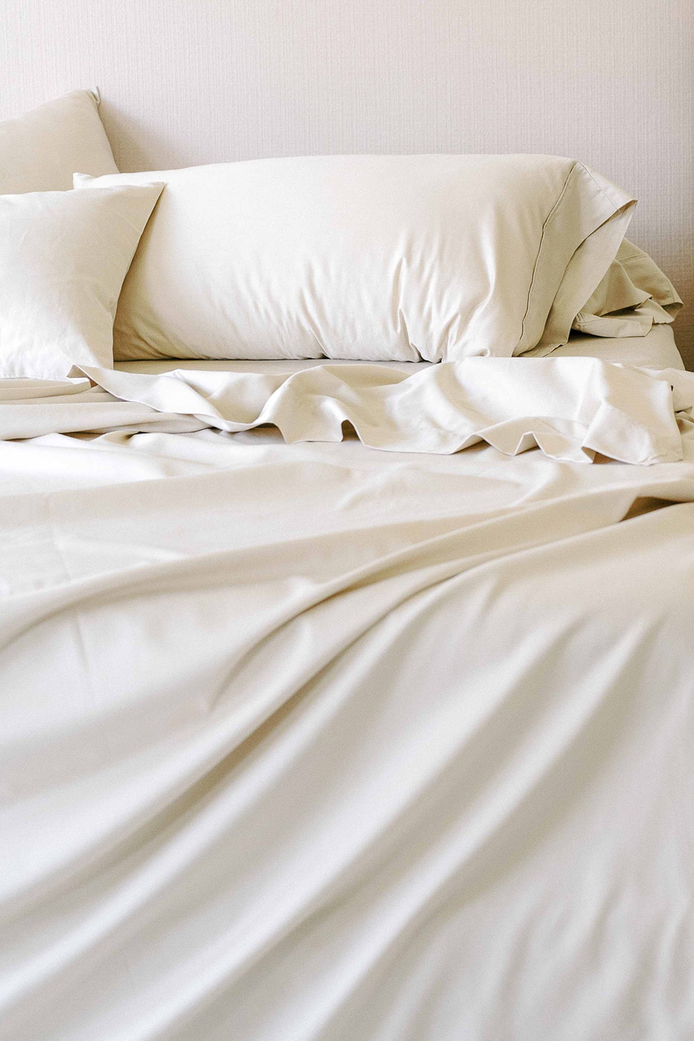 Close-up of cotton sheets, promoting airflow and comfort