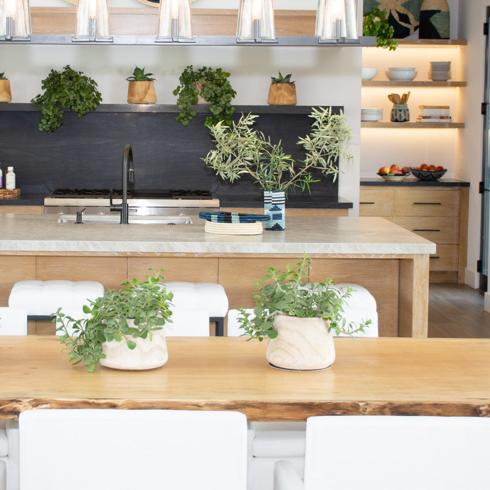 A well-organized kitchen with neatly stacked shelves