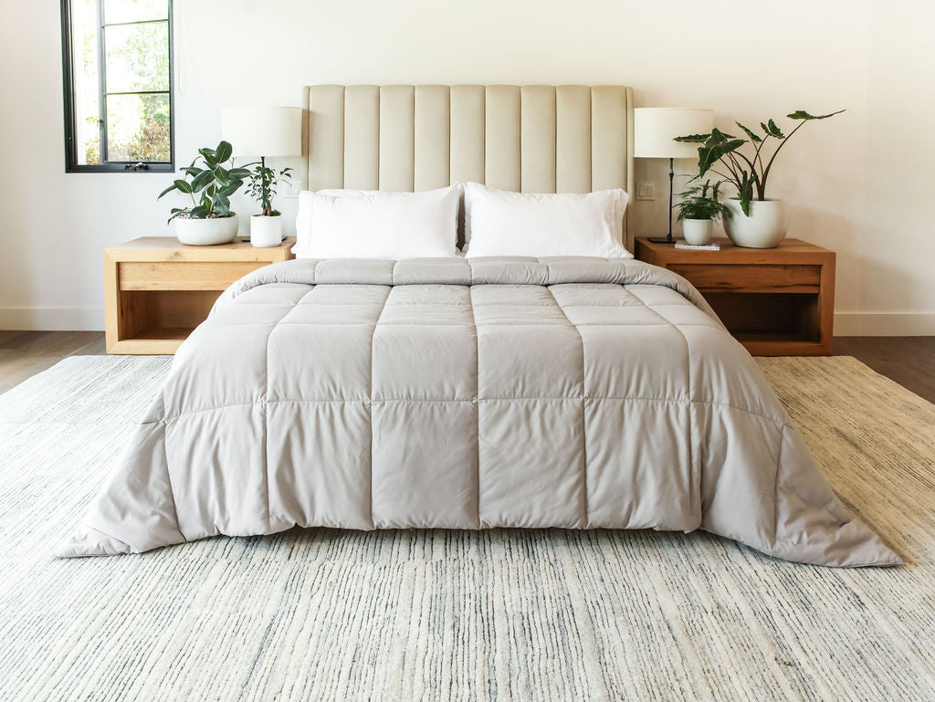 Restful sleep environment with a down alternative duvet insert, promoting relaxation