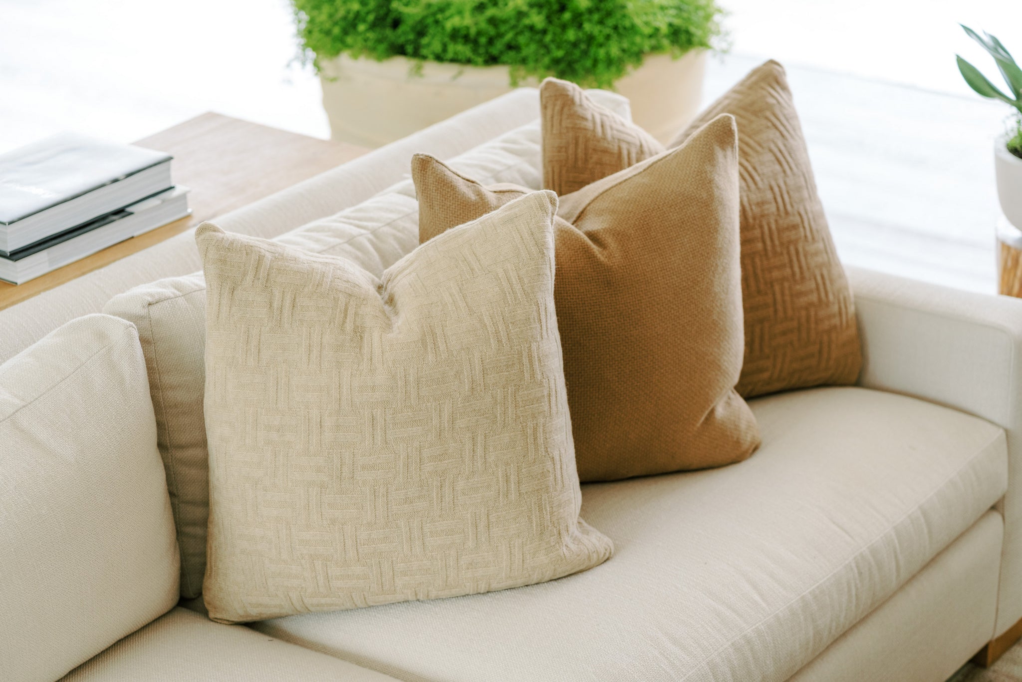 Warm, earthy-colored decorative pillows adding rustic elegance
