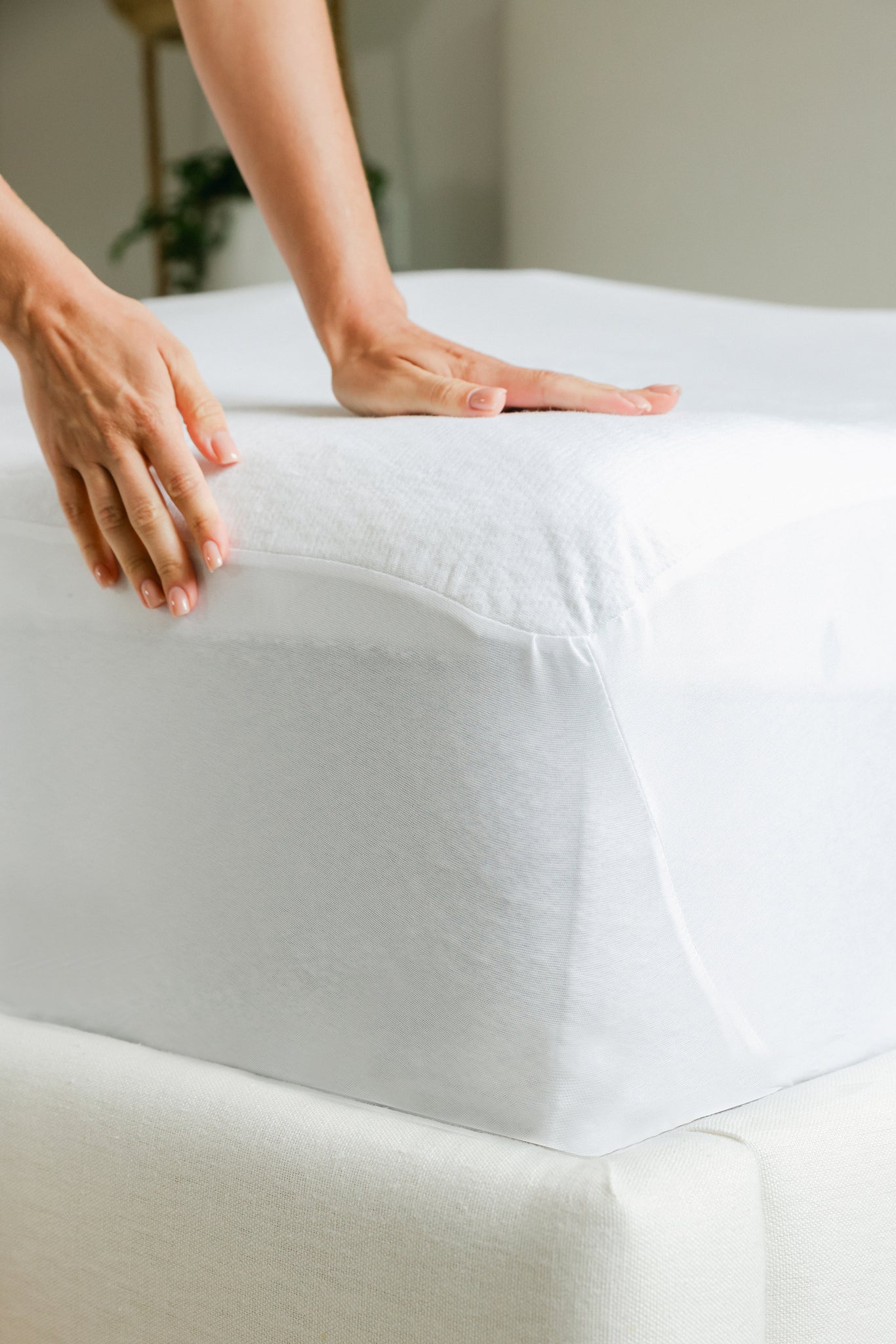 Cool Cotton Mattress Protector being fitted onto a mattress