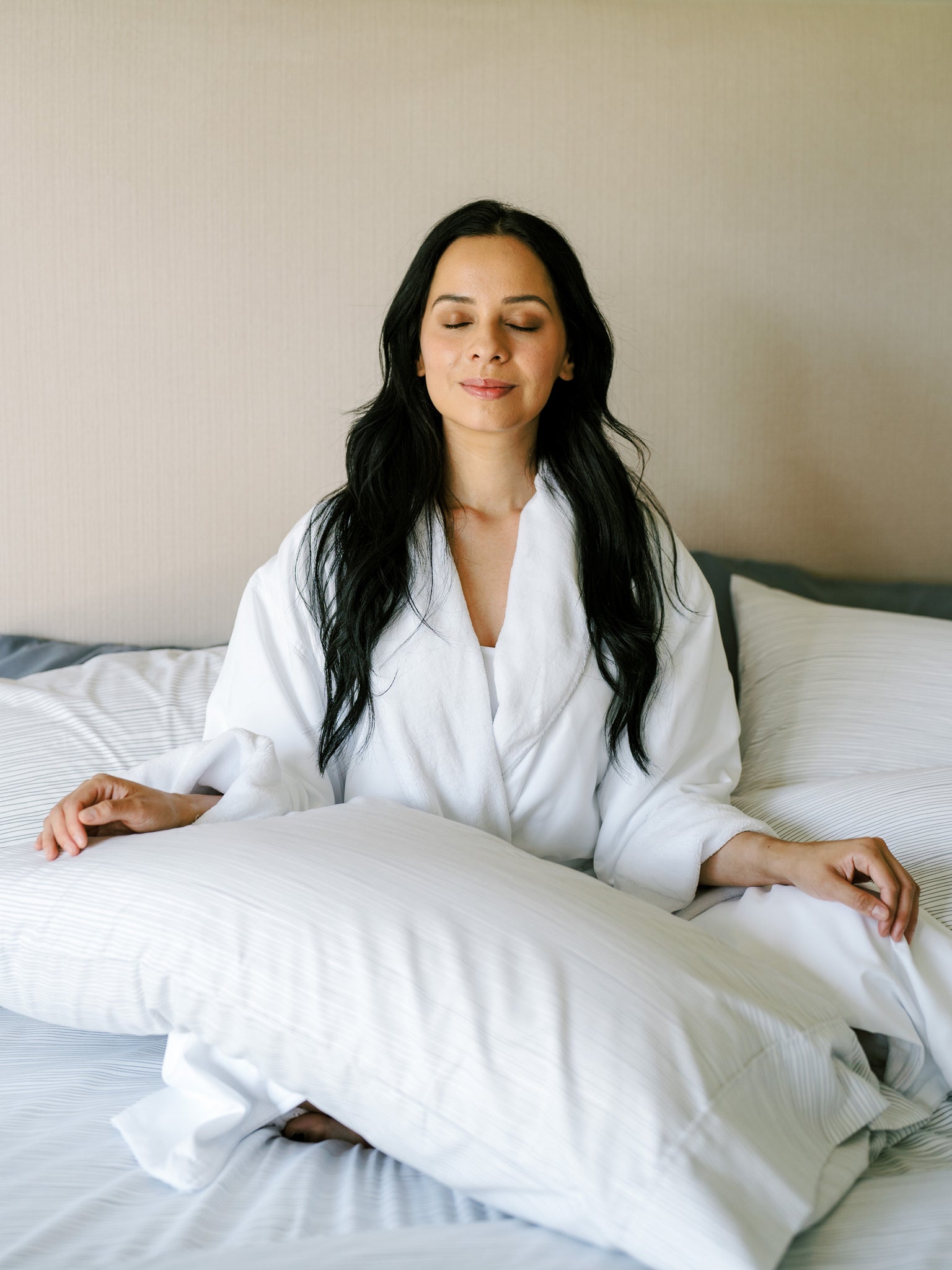 Woman meditating with a serene expression