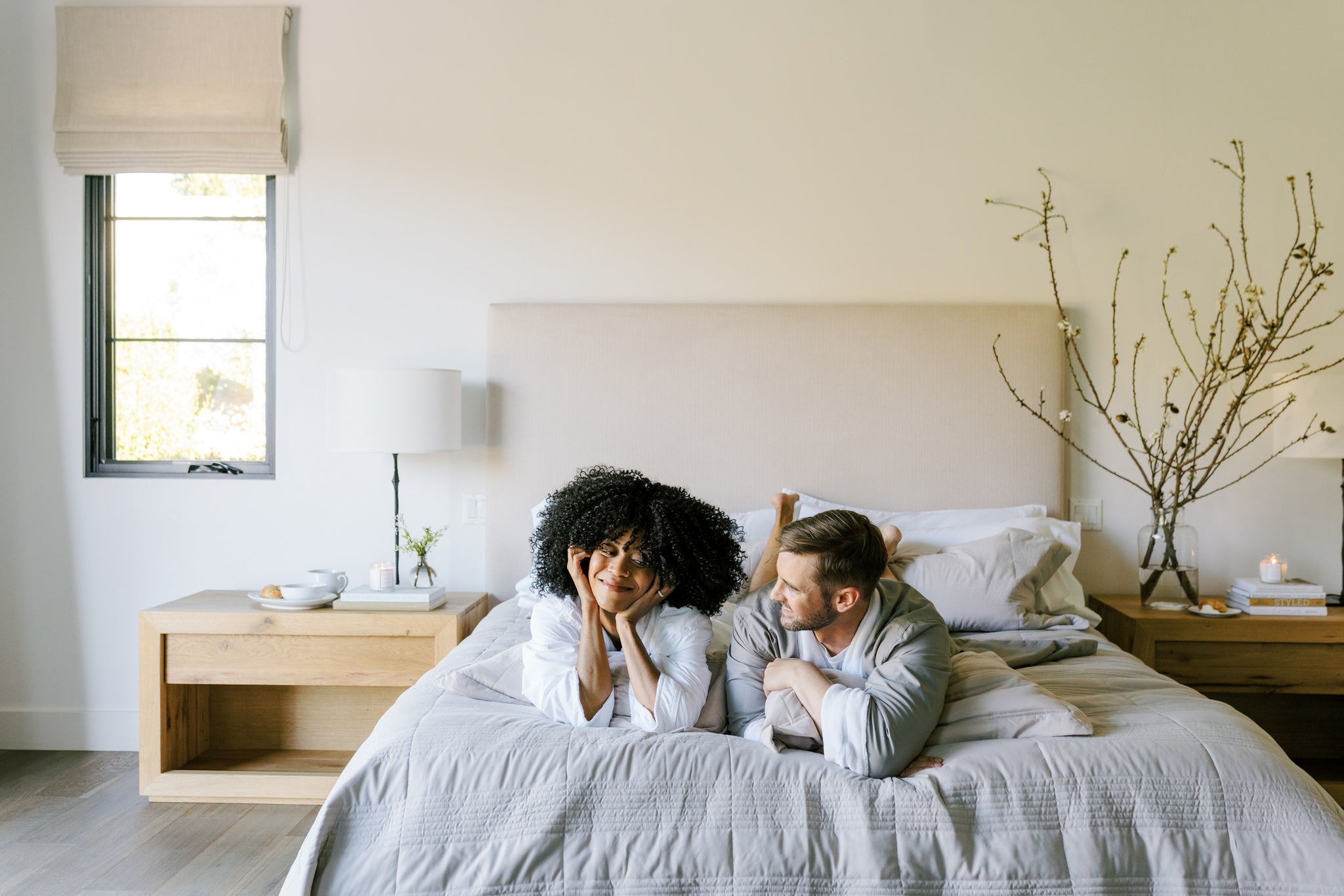 Couple laughing and supporting each other