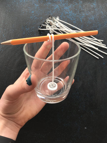 how to center a candle wick with a pencil
