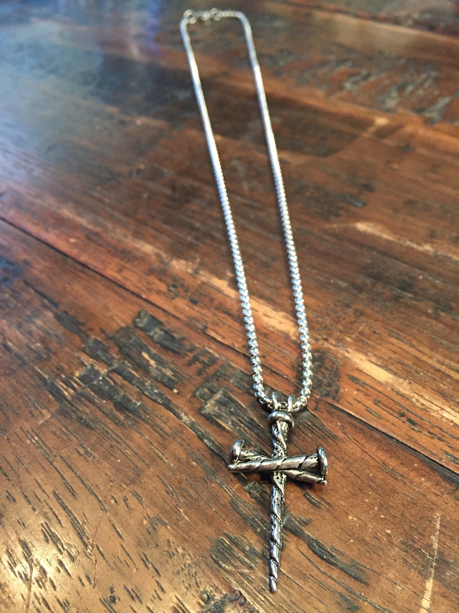 mens nail cross pendant