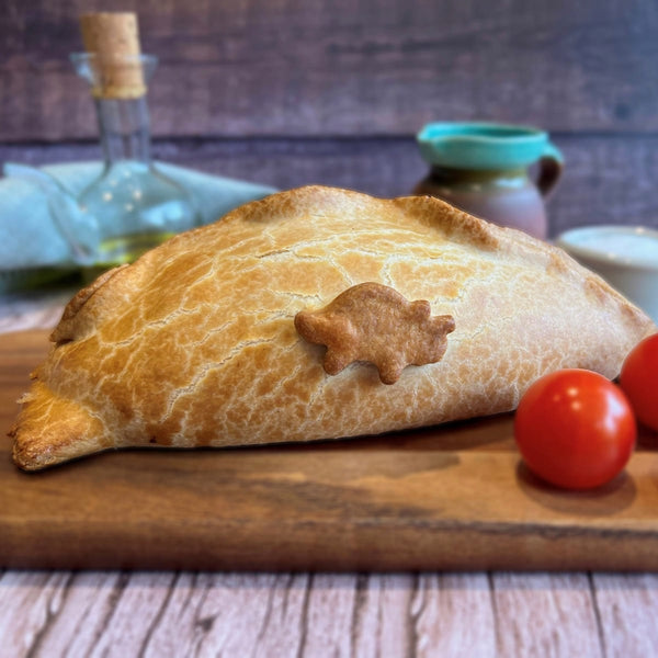 Dinosaur pasty on a chopping board