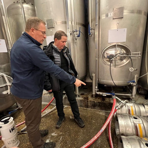 Christian being shown around the brewery