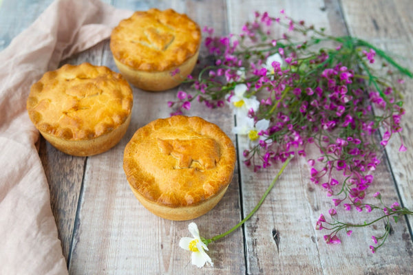 Mud pies with pink flowers