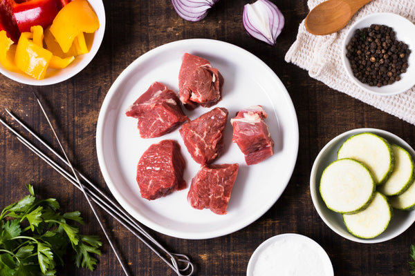 Chunks of beef with various other seasoning ingredients