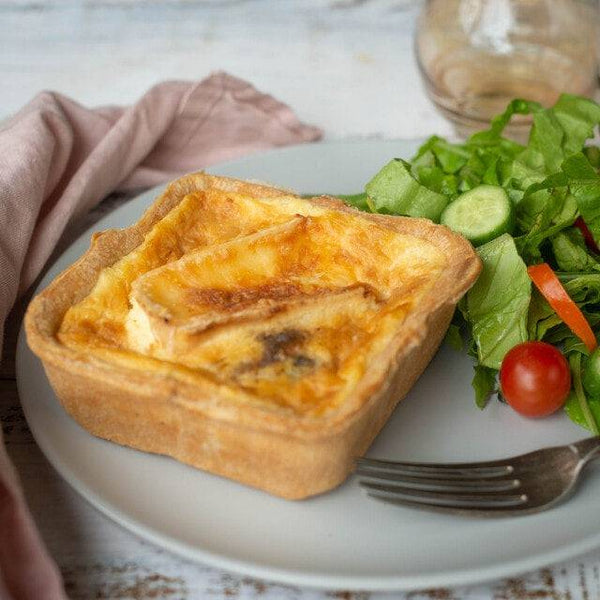 Red onion and marmalade quiche with salad