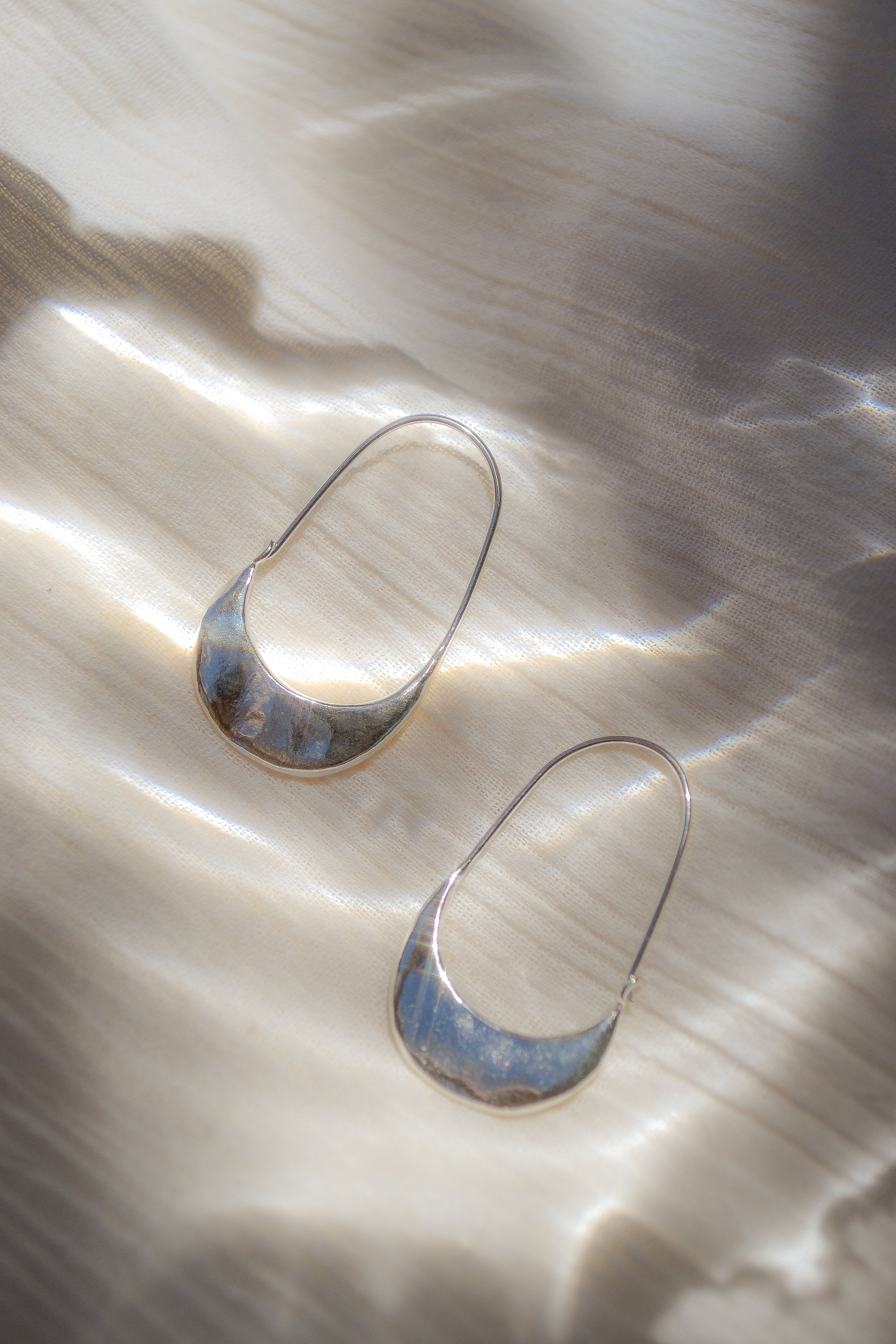 Sterling silver Muse hoops by Amanda Hunt available at Thread Spun