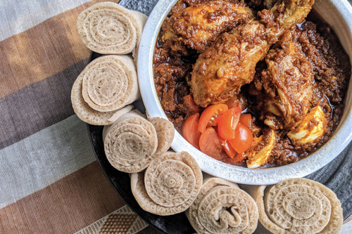 Eritrean & Ethiopian Cuisine Doro Wat (Saucy Berbere Spiced Chicken Stew) with Injera Bread - Foodhini