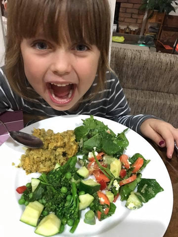 Ariella with butter chicken, cauli rice, salad and veges