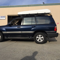 100 Series Toyota Landcruiser with white iKamper Skycamp Roof Top Tent