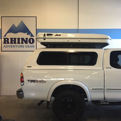 White Toyota Tundra with James Baroud Roof Top Tent installed on Leer cap