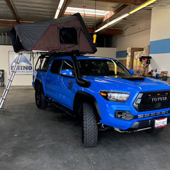 voodoo blue 2019 Toyota Tacoma TRD Pro with Leitner Bedrack and rocky black linex iKamper Roof Top Tent installed at Rhino Adventure Gear California