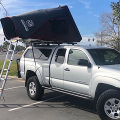 Toyota Tacoma with iKamper Skycamp Roof Top Tent installed on topper