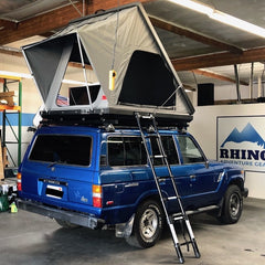 Camp King Roof Top Tent on blue FJ 60 Toyota Land Cruiser