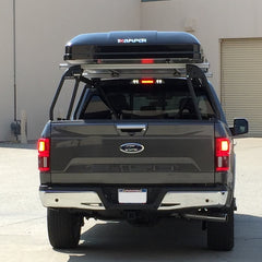 Ford F150 with iKamper Roof Top Tent installed on custom roof rack