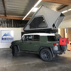 Toyota FJ Cruiser with Custom Rack system and Camp King Aluminum Roof Top Tent installed