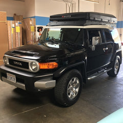 Toyota FJ Cruiser with Rocky Black Line-X iKamper Skycamp Roof Top Tent installed