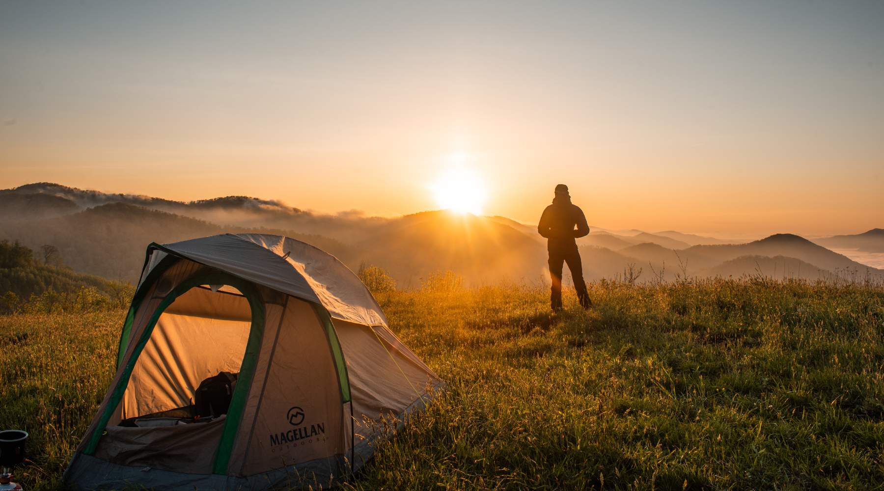Hiking Tent and Man Watching Sunset