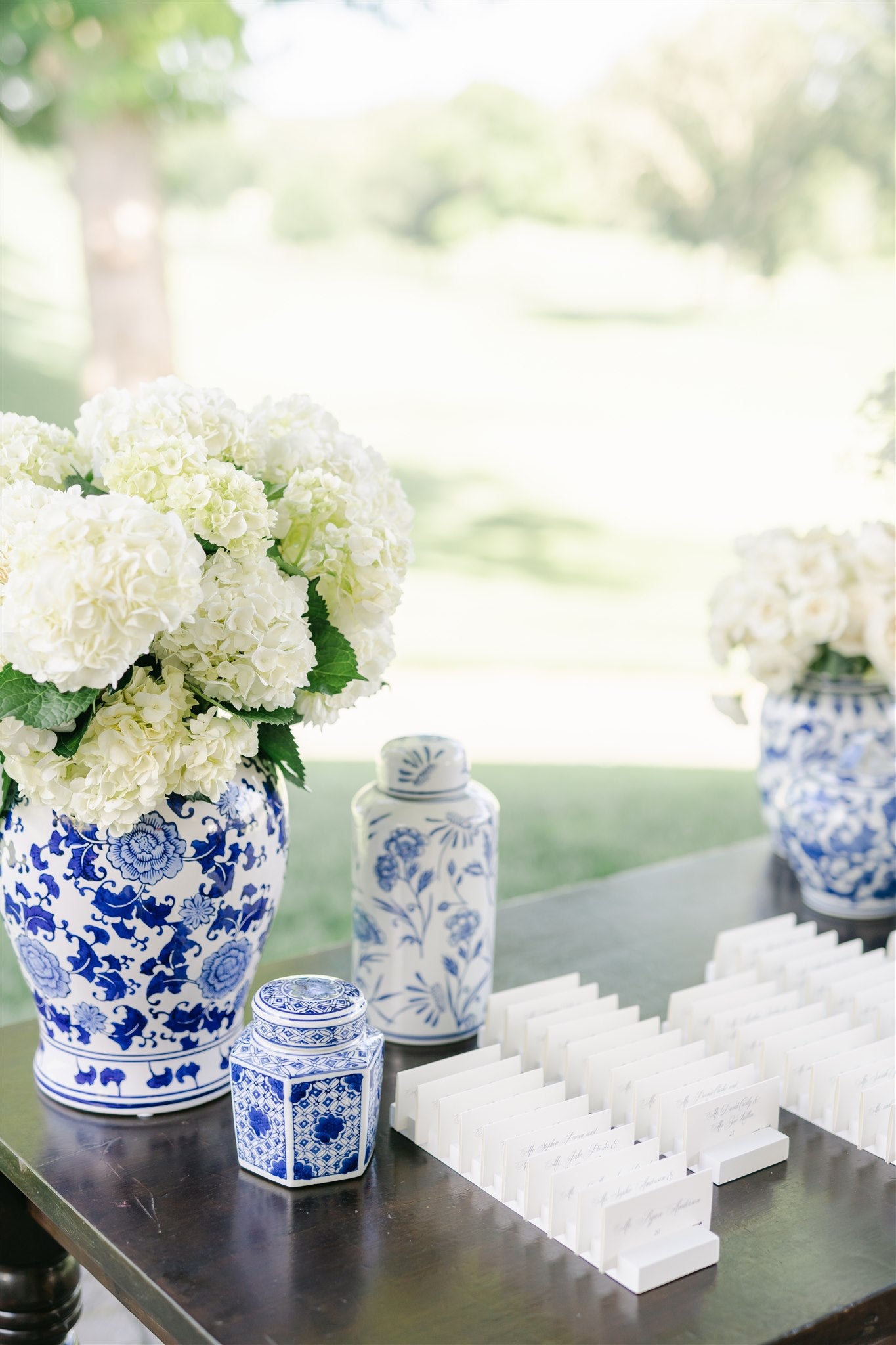 blue and white ginger jars with white flowers