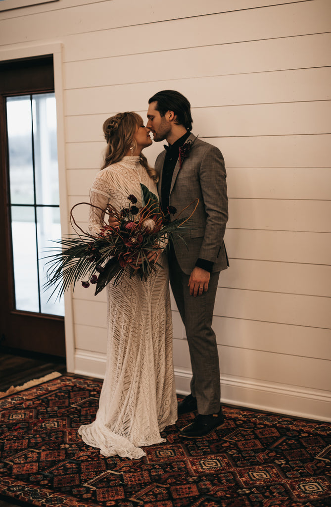 bride and groom kissing 