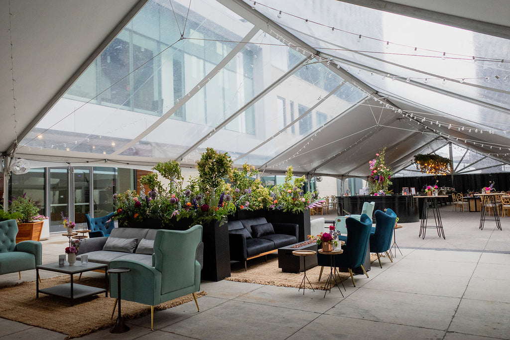 overall view of lounge seating and floral planters 