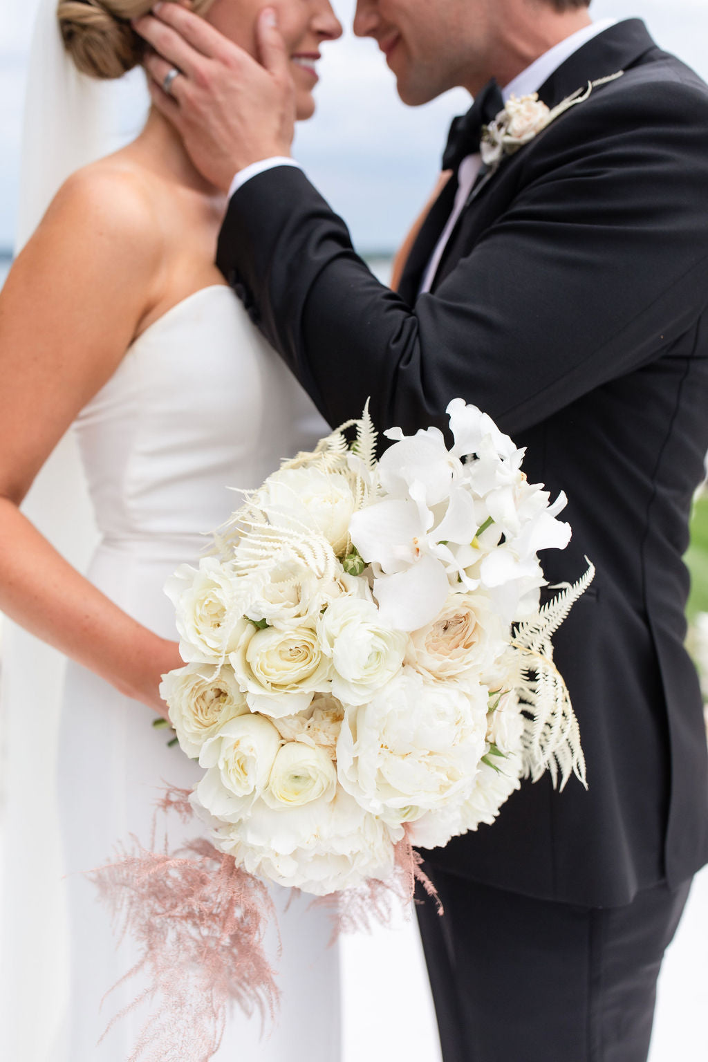 bride and groom embracing 